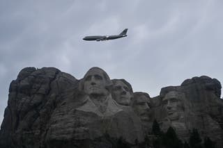 Air Force One flies over Mount Rushmore on Friday ahead of President Donald Trump’s speech